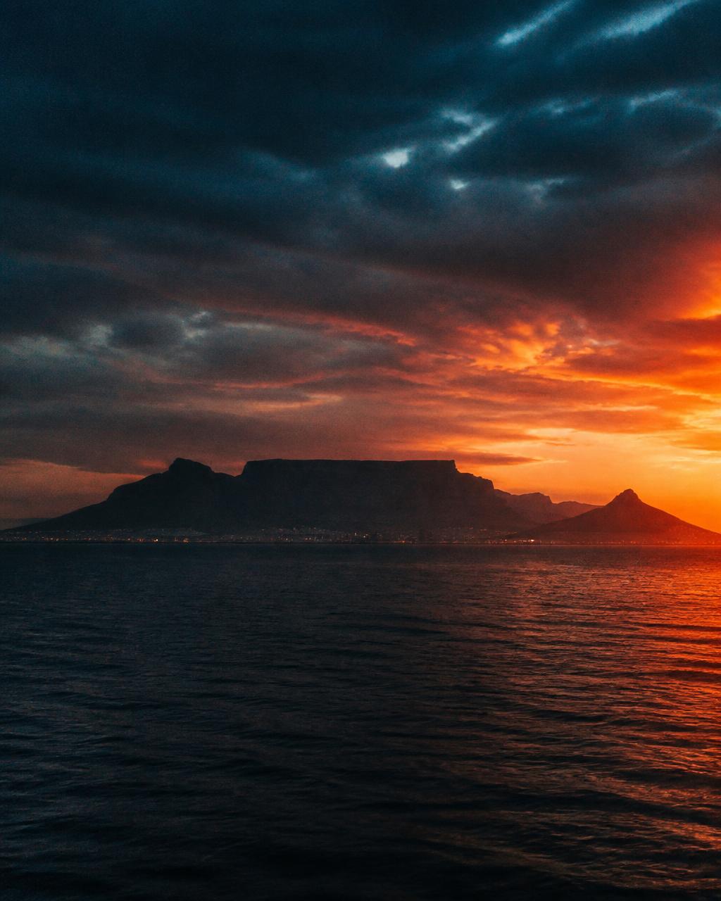 Table Mountain in silhouette at sunset